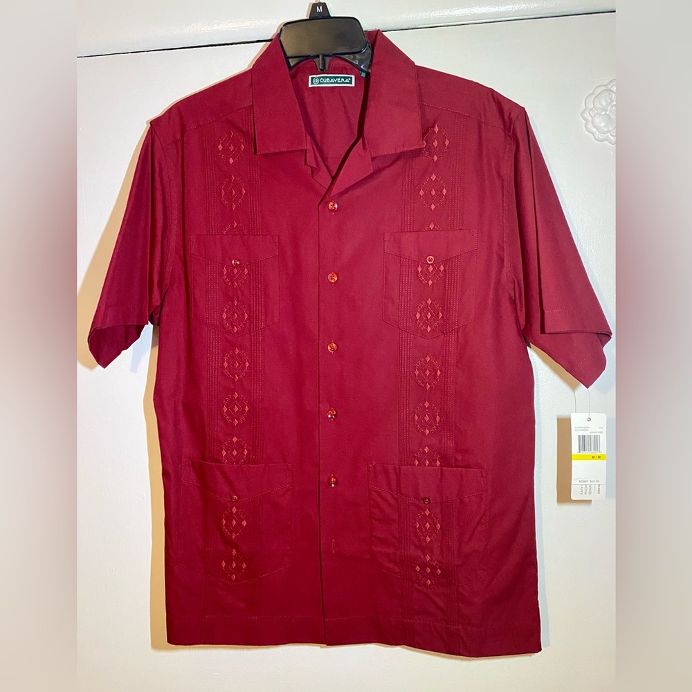 Brand new Cubavera shirt with tags. Size medium. Brand new never worn.